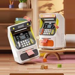 Детская Копилка-сейф в виде банкомата (2 вида, звуки, подсветка, игрушечная карточка, в коробке) 7012 А